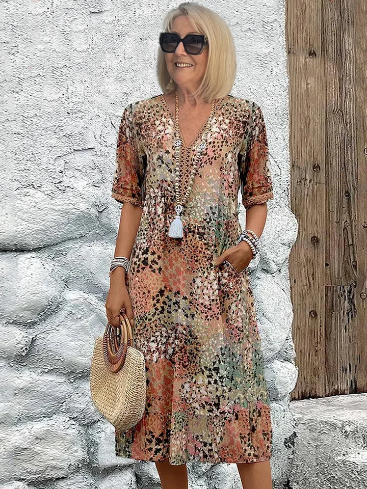 SUSAN | VESTITO MIDI VIBRANTE CON ELEGANTE COPERTURA DELLA PANCIA