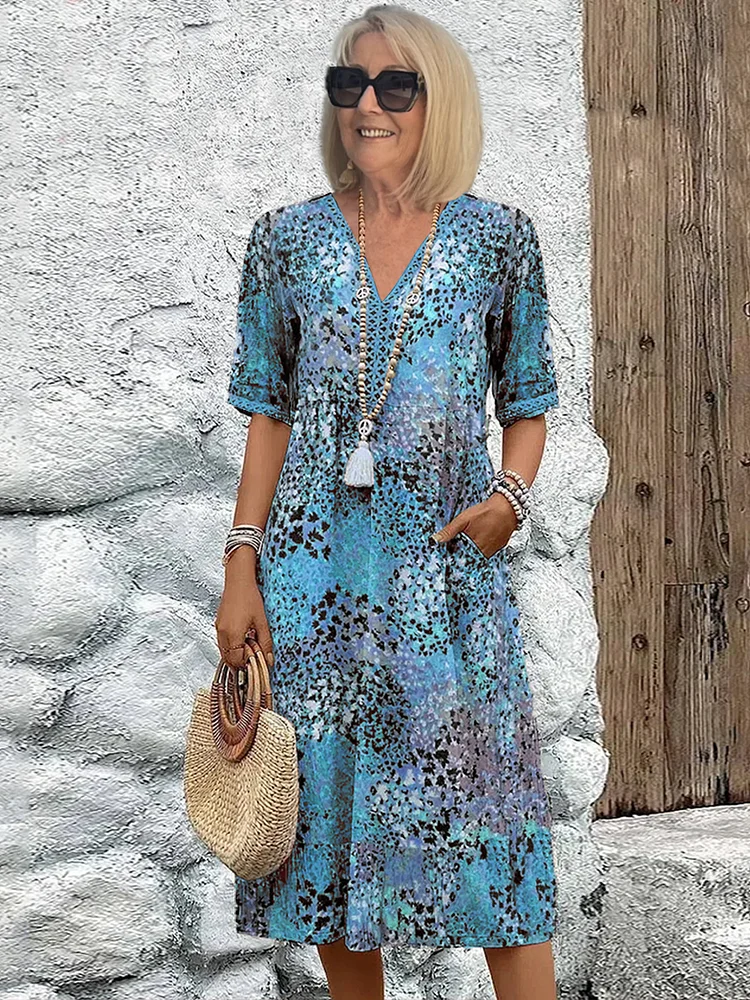 SUSAN | VESTITO MIDI VIBRANTE CON ELEGANTE COPERTURA DELLA PANCIA